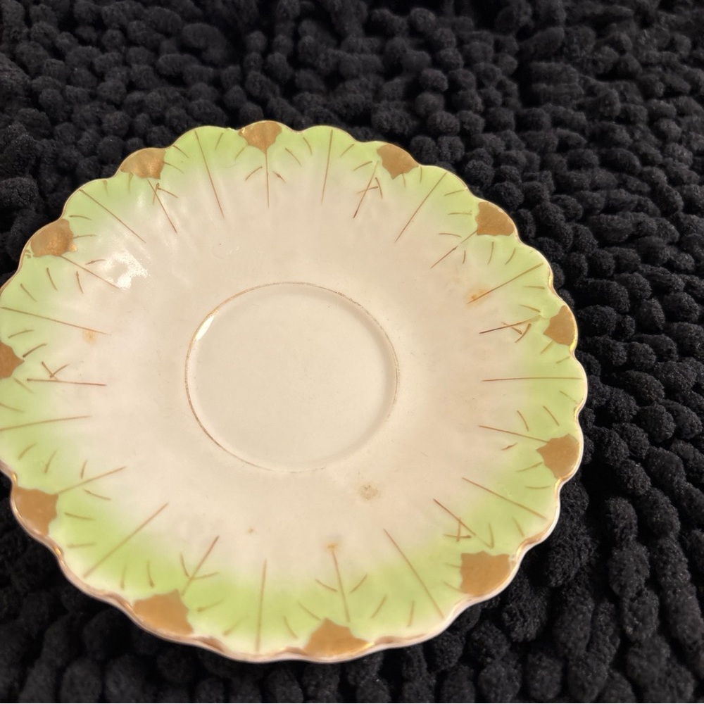 Elegant Green and Cream Saucer